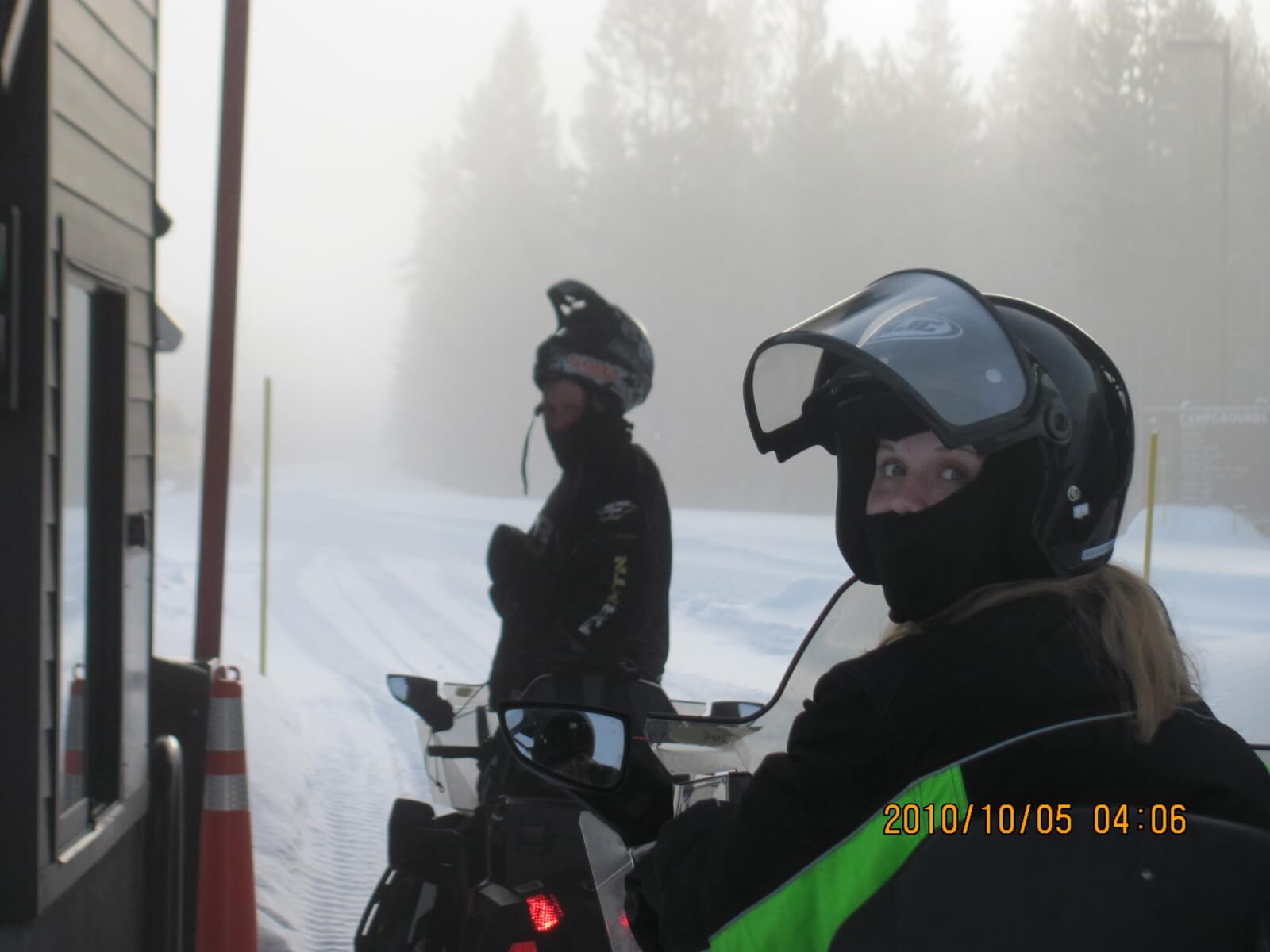 DAUGHTER AND I  SNOWMOBILING  IN  WEST YELLOWSTONE, MONTANA