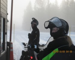 DAUGHTER AND I  SNOWMOBILING  IN  WEST YELLOWSTONE, MONTANA